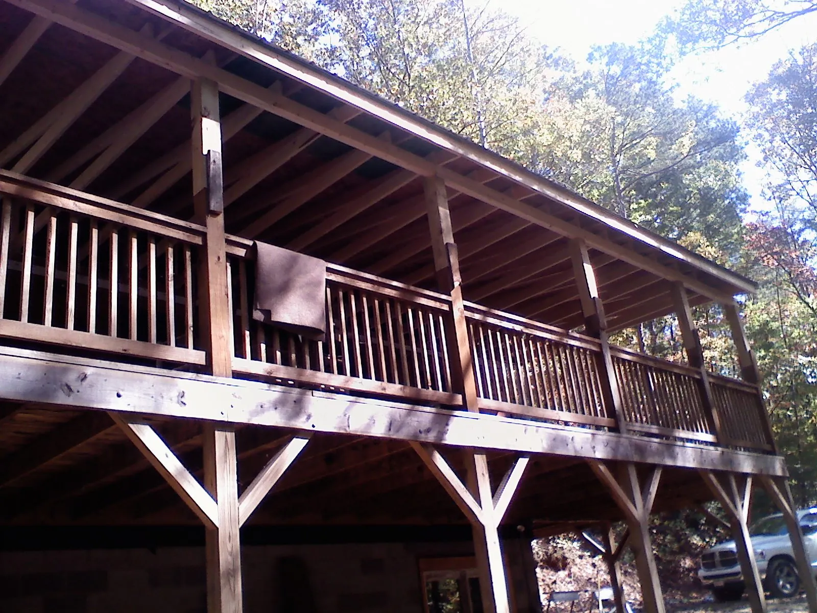 Timber framing under a new elevated porch and deck — Roof Leak Repair in Tuxedo Park by Roofing Brothers